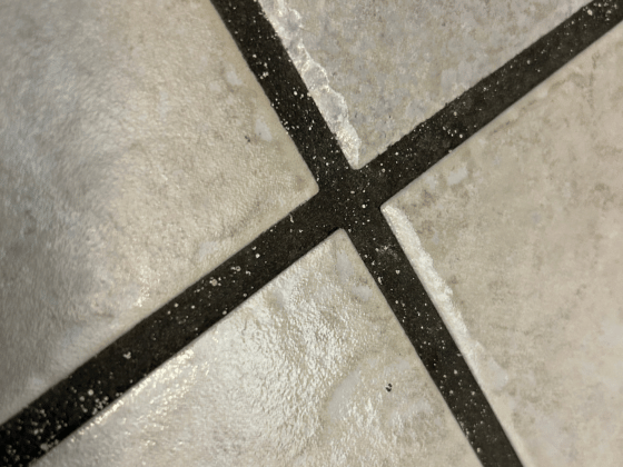 Heavily discolored ceramic tile grout