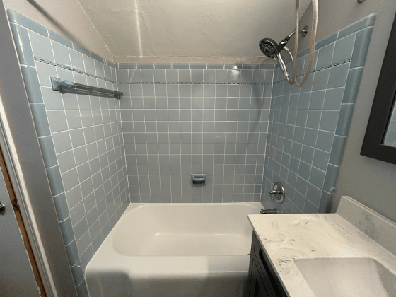 Porcelain tile shower after restoration.